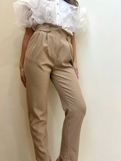 PANTALONE CON BOTTONI LATERALI